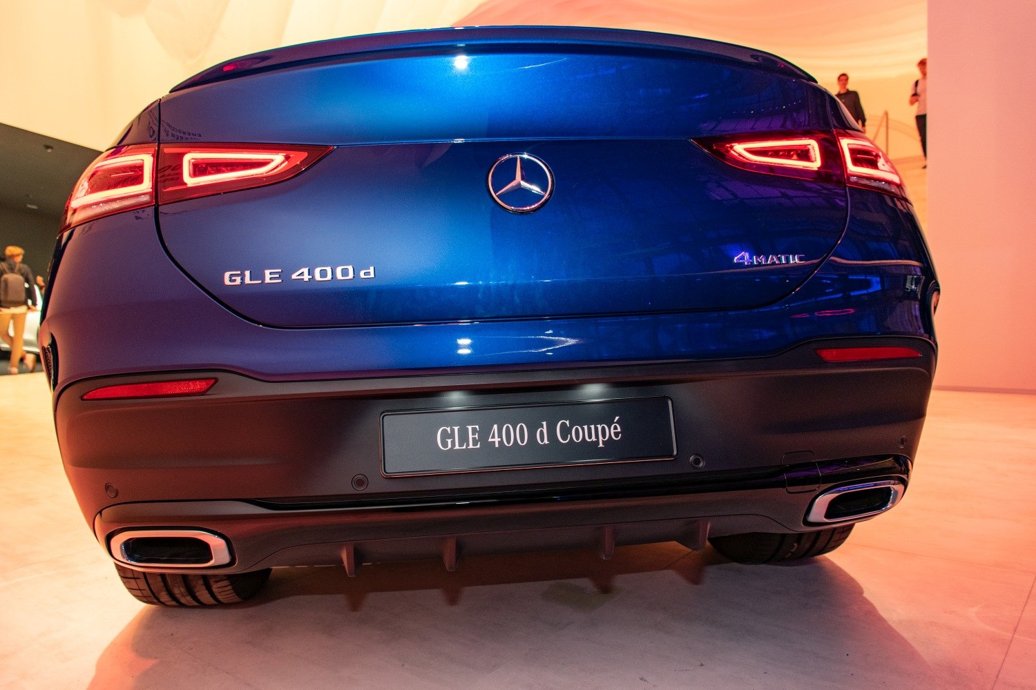 Rear view with LED taillights, dual exhausts, and 4MATIC badge
