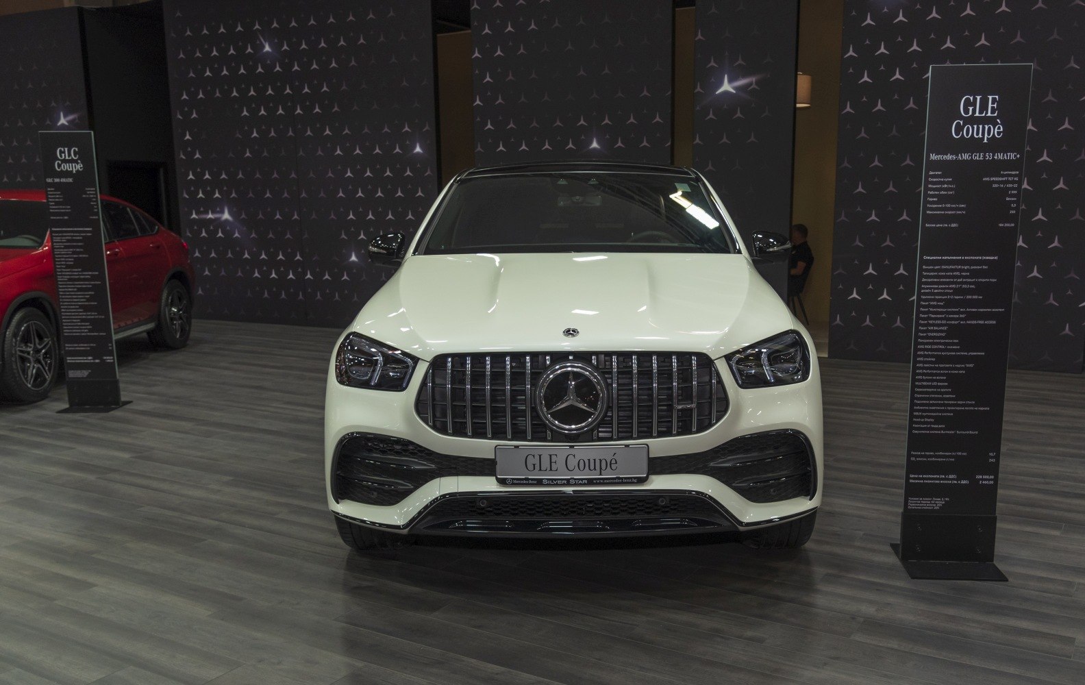Front view of luxury SUV with vertical grille and LED headlights