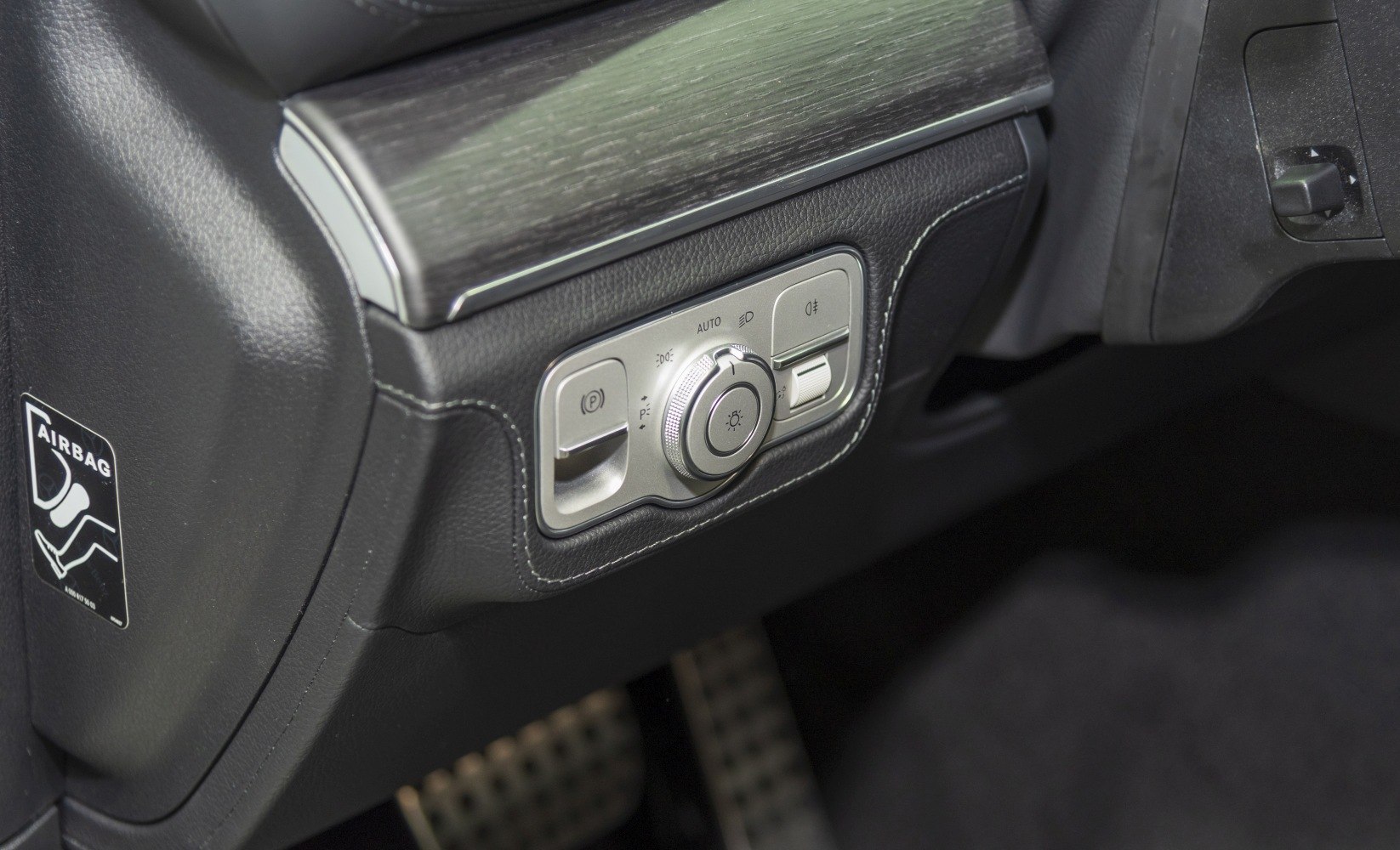 Car interior light control switch and parking brake button