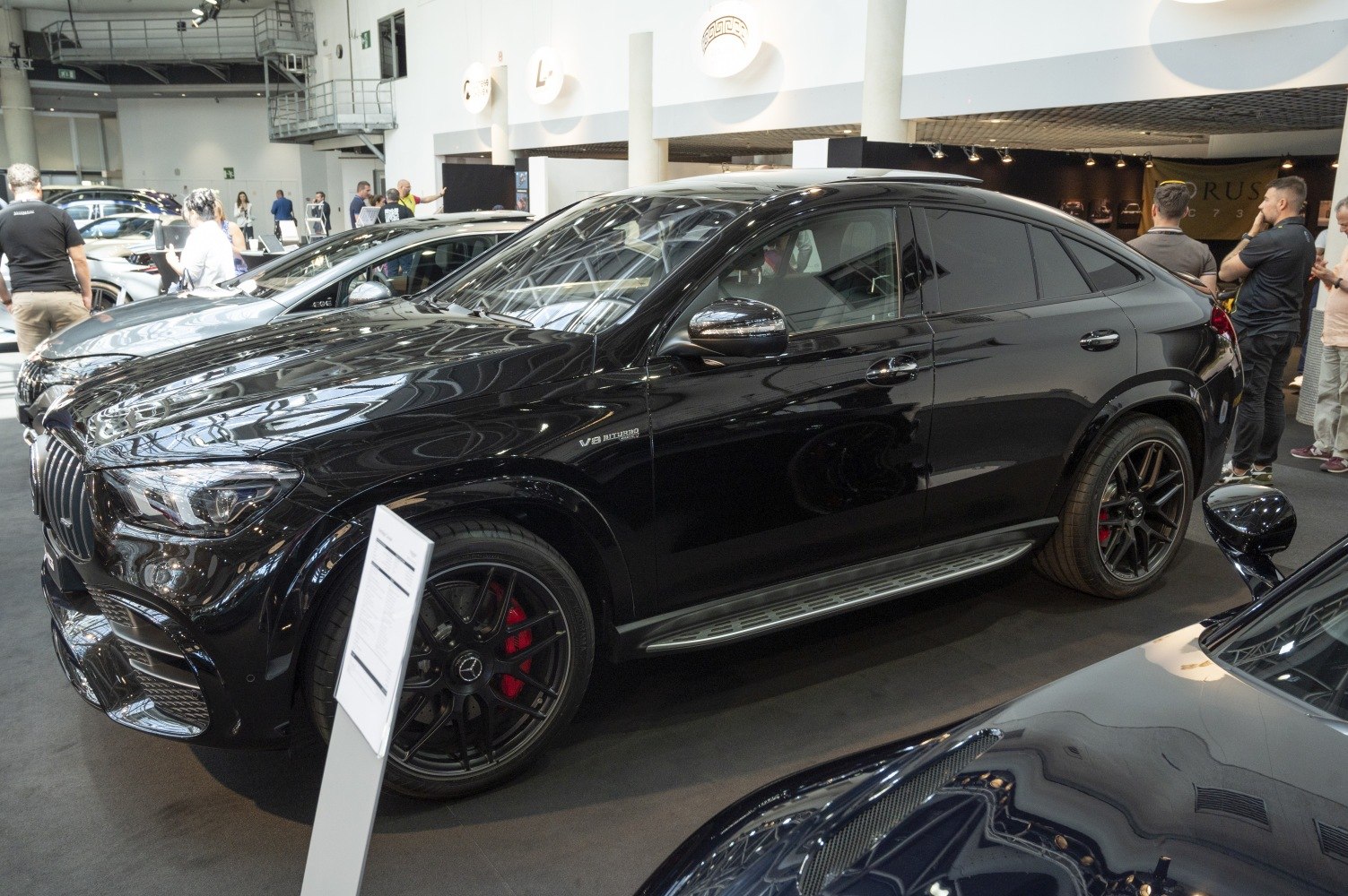 Sporty black SUV coupe with V8 biturbo engine and sleek tinted windows