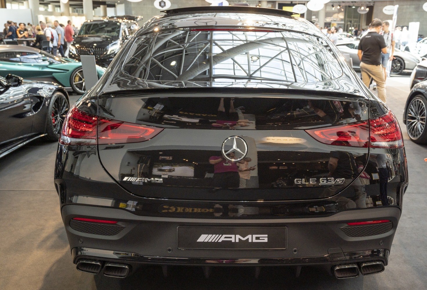 Rear view with taillights and quad AMG exhausts