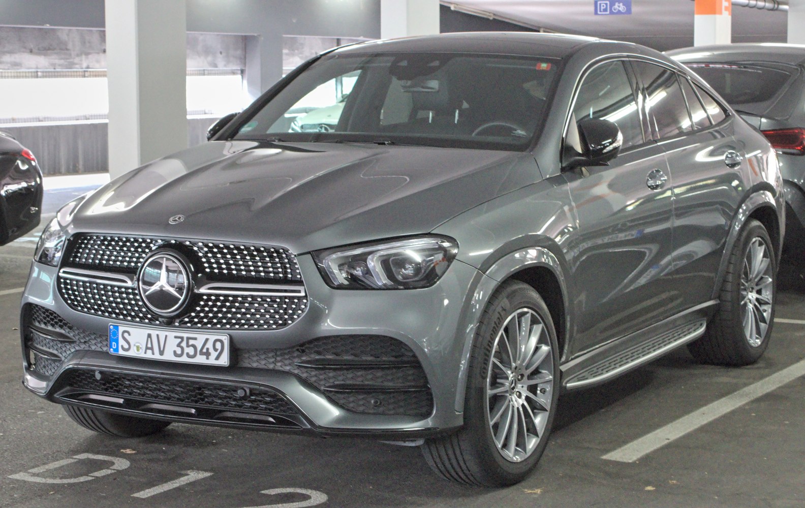 Front view with LED headlights and prominent grille design