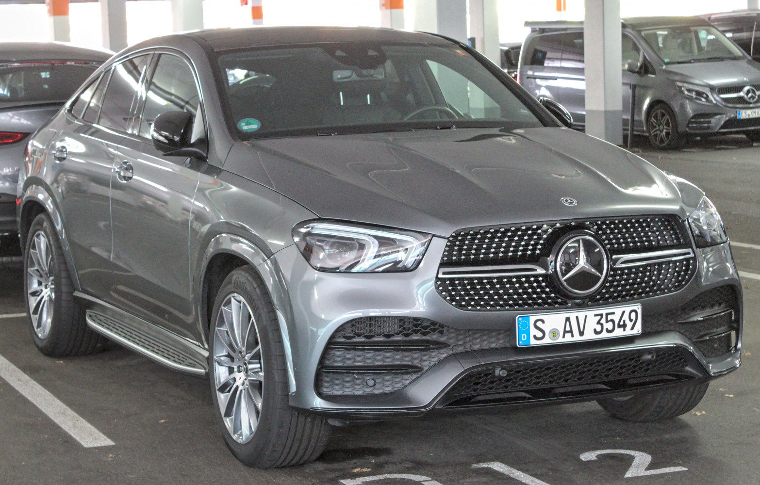 Front view of SUV coupe with distinctive grille and LED headlights