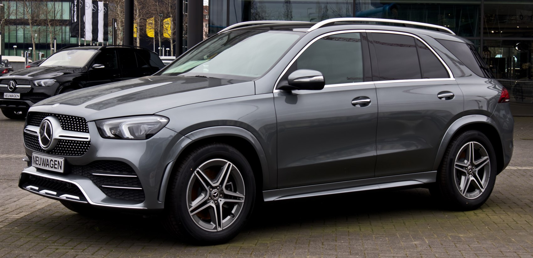 Modern SUV with distinctive grille, LED headlights, alloy wheels, and roof rails