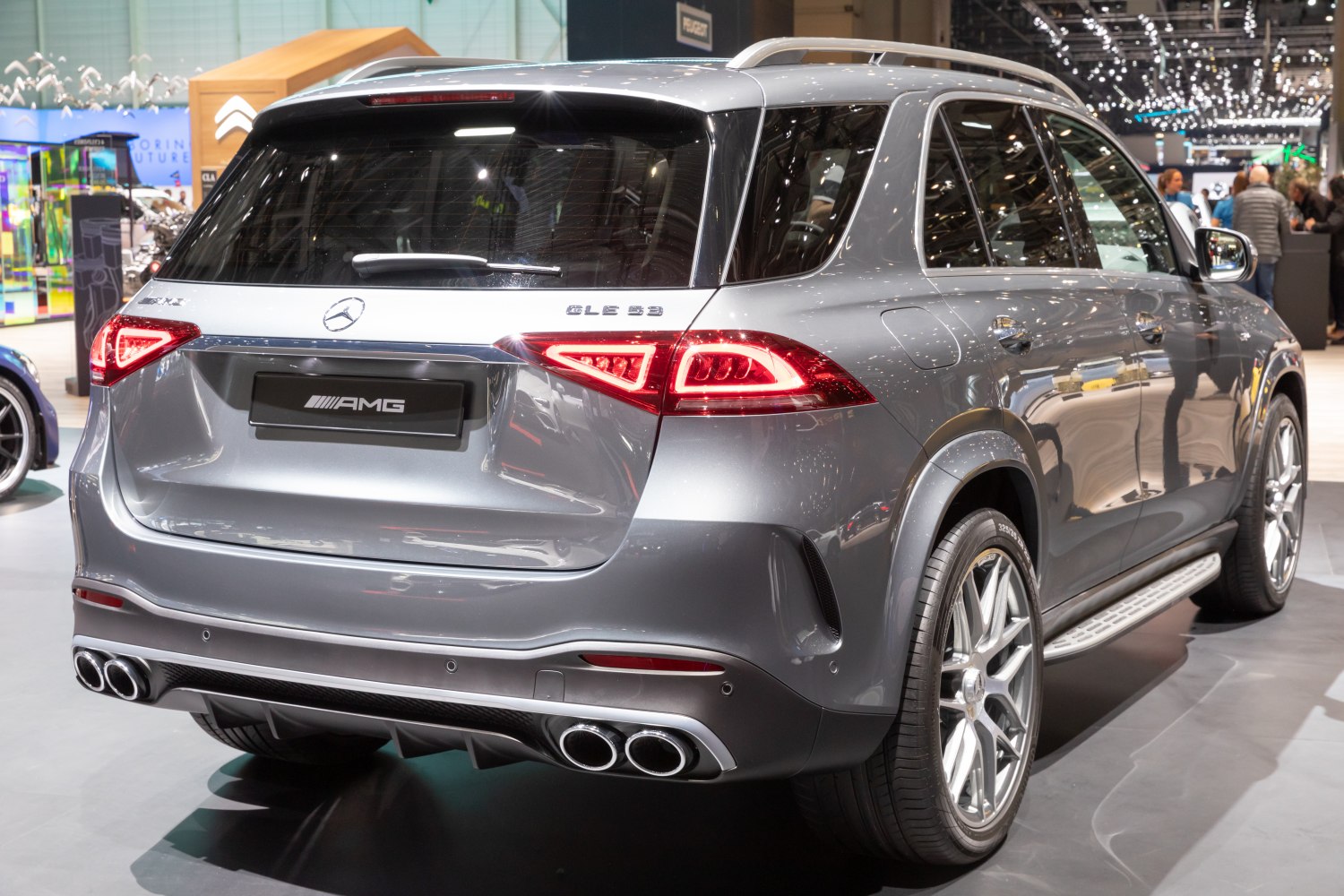 Rear view of SUV with quad exhausts and LED taillights