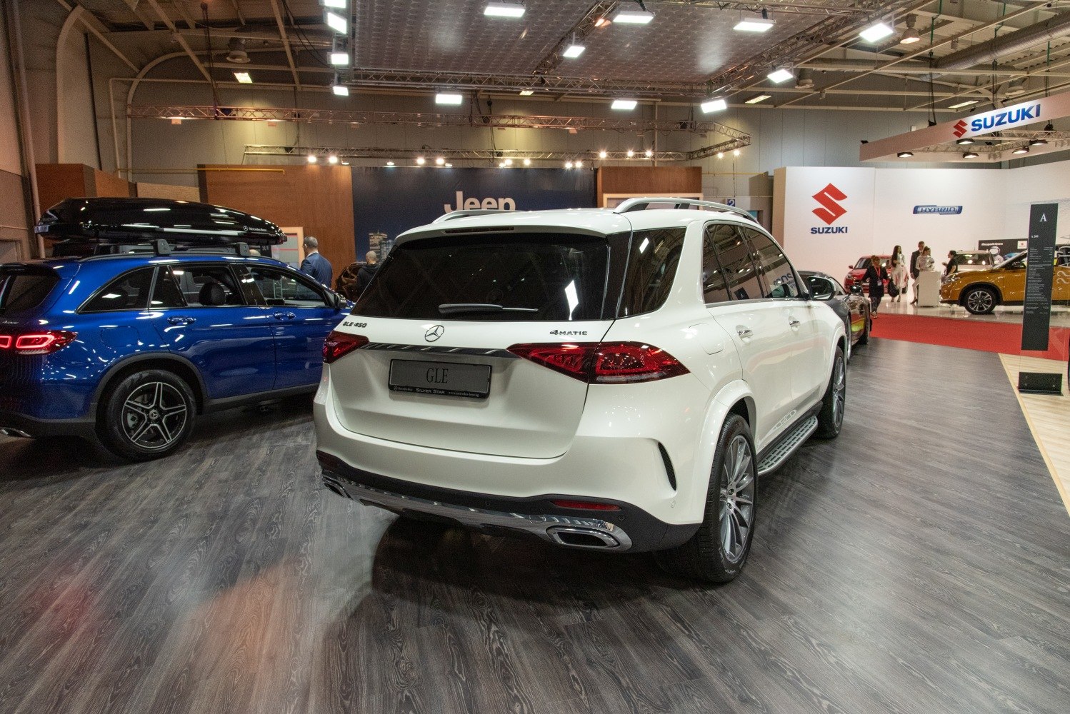 Luxury SUV rear view with LED tail lights and chrome twin exhausts