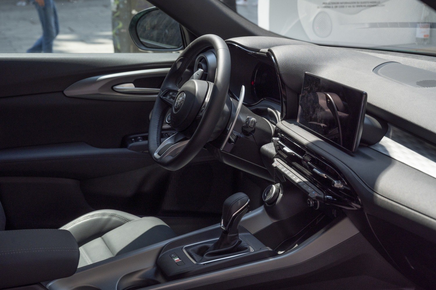 Modern dashboard and multifunction steering wheel with infotainment screen