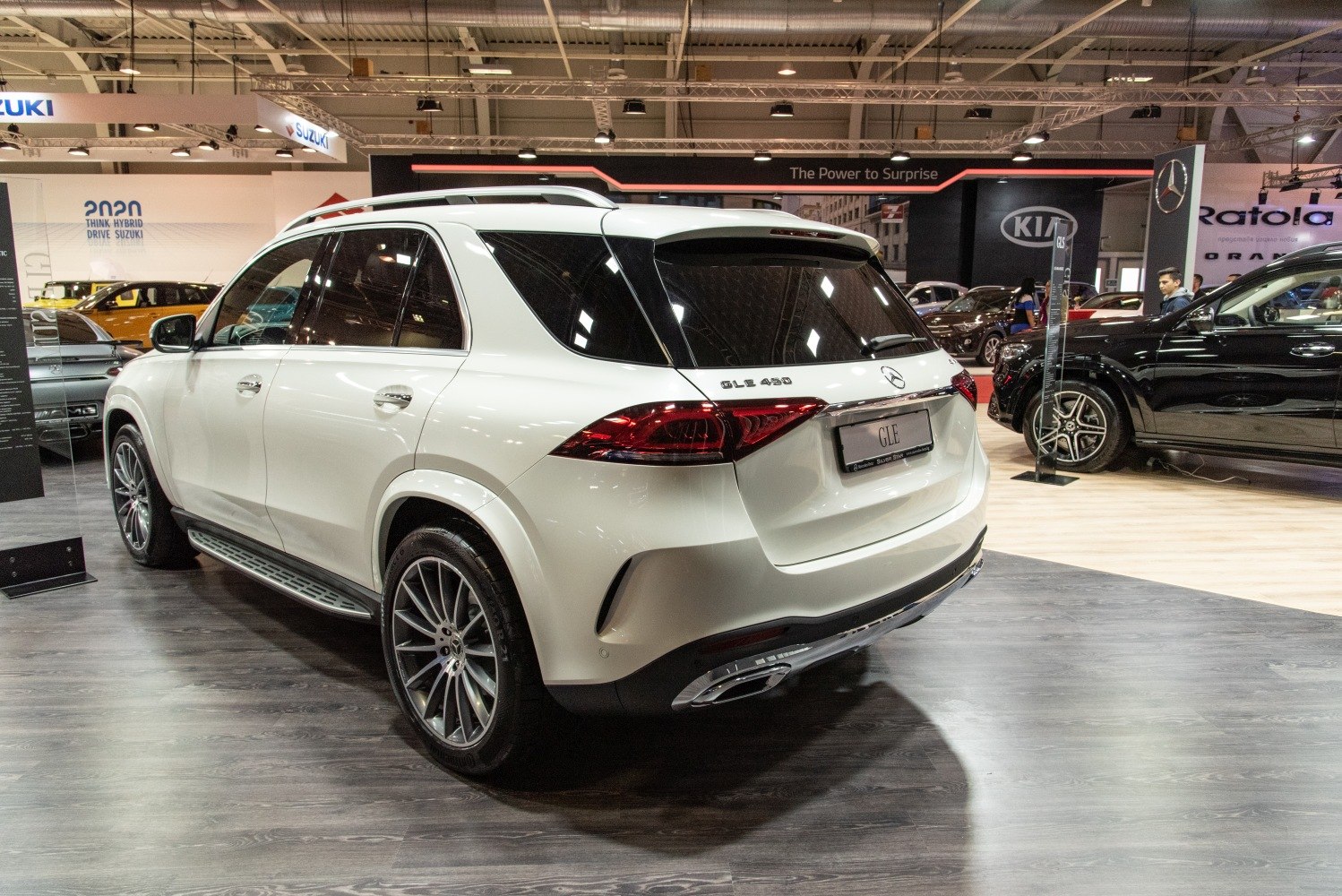 Rear three-quarter white SUV with alloy wheels and LED tail lights