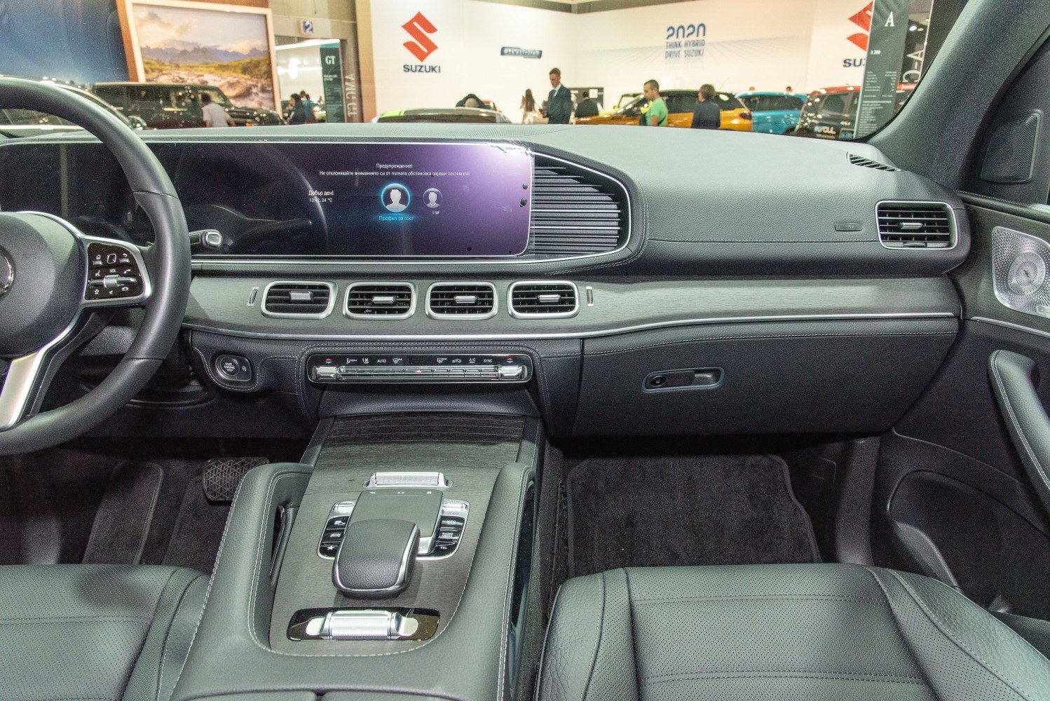 Modern luxury SUV dashboard with digital infotainment and control panels