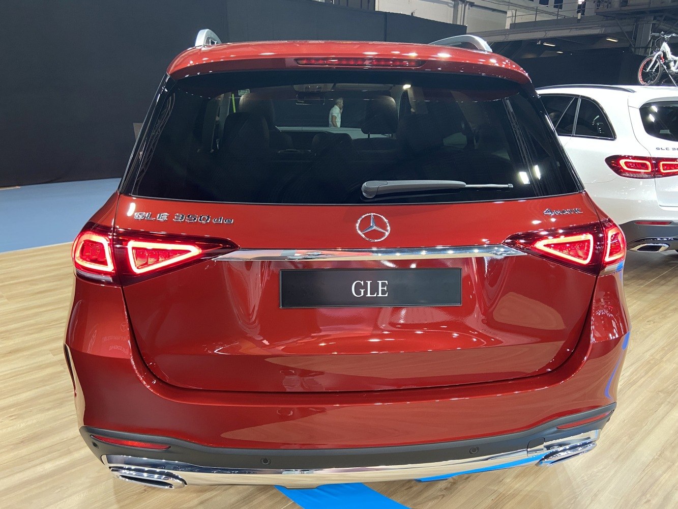 Rear view with taillights, badges, and chrome accents