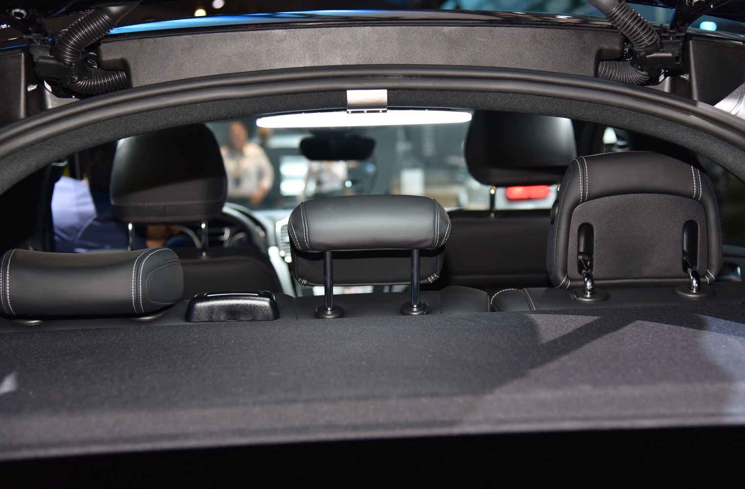 Black leather rear headrests and parcel shelf