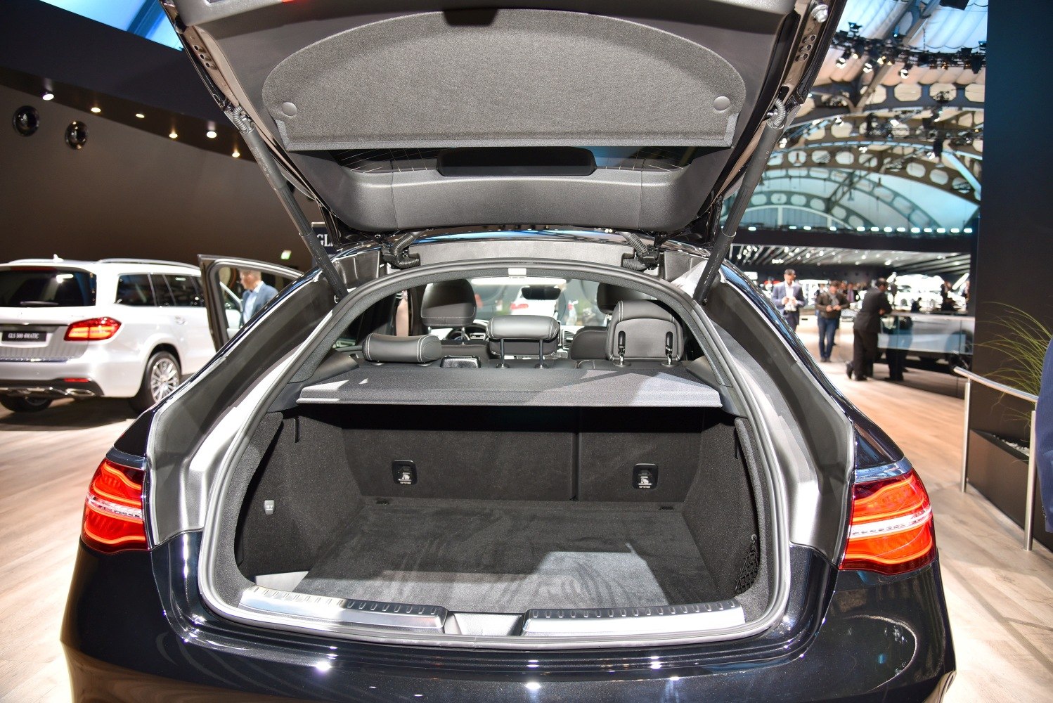 Open trunk with spacious cargo area and rear seats visible