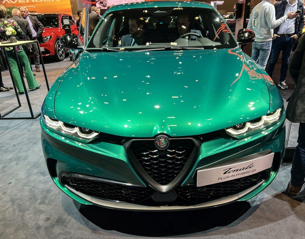 Front view with signature grille and triple LED headlights