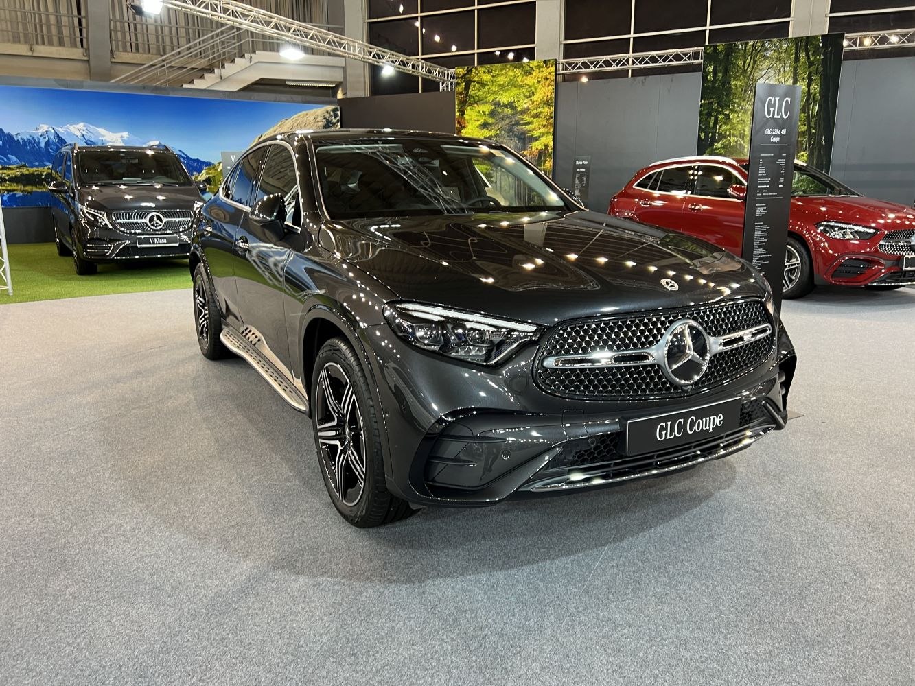 Front view of luxury SUV with LED headlights and prominent grille