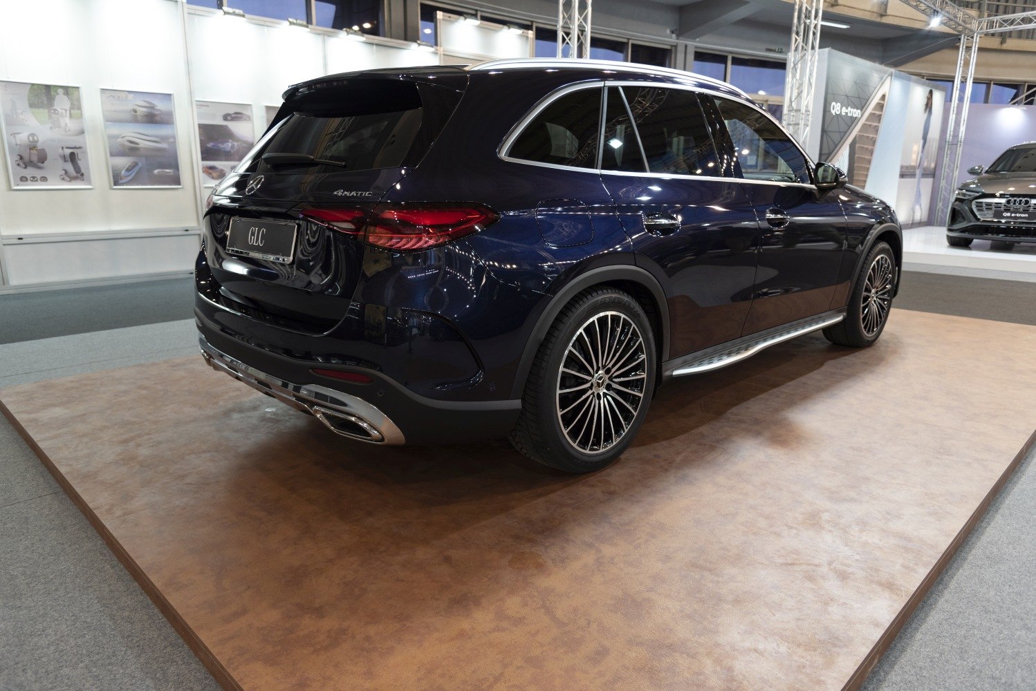 Rear and side view of luxury SUV with distinctive taillights and alloy wheels