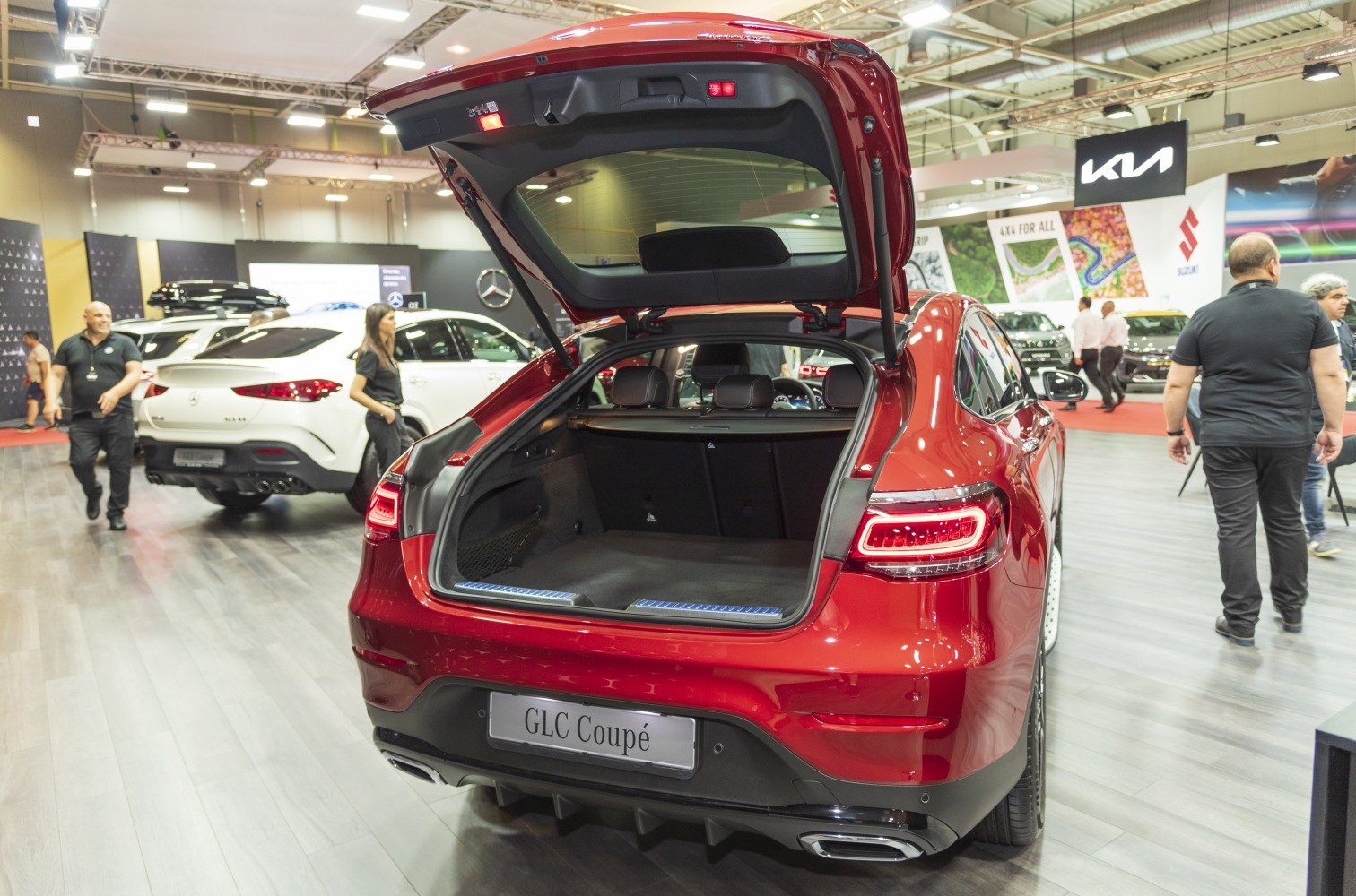 Open trunk and rear LED lights of a luxury coupe SUV