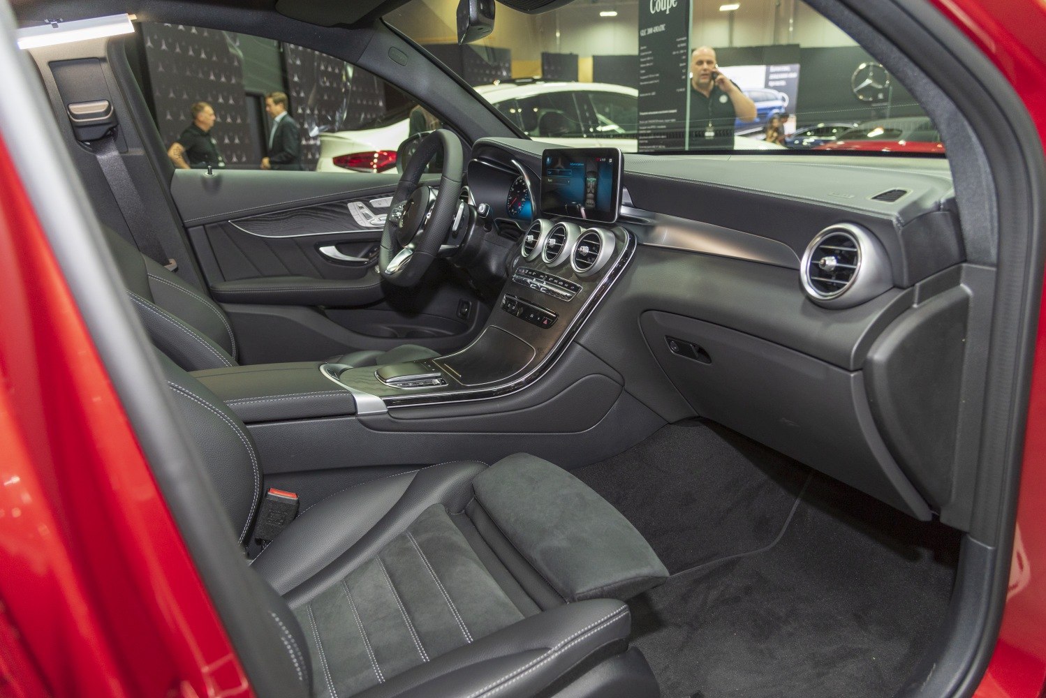 Dashboard with infotainment screen and leather front seats