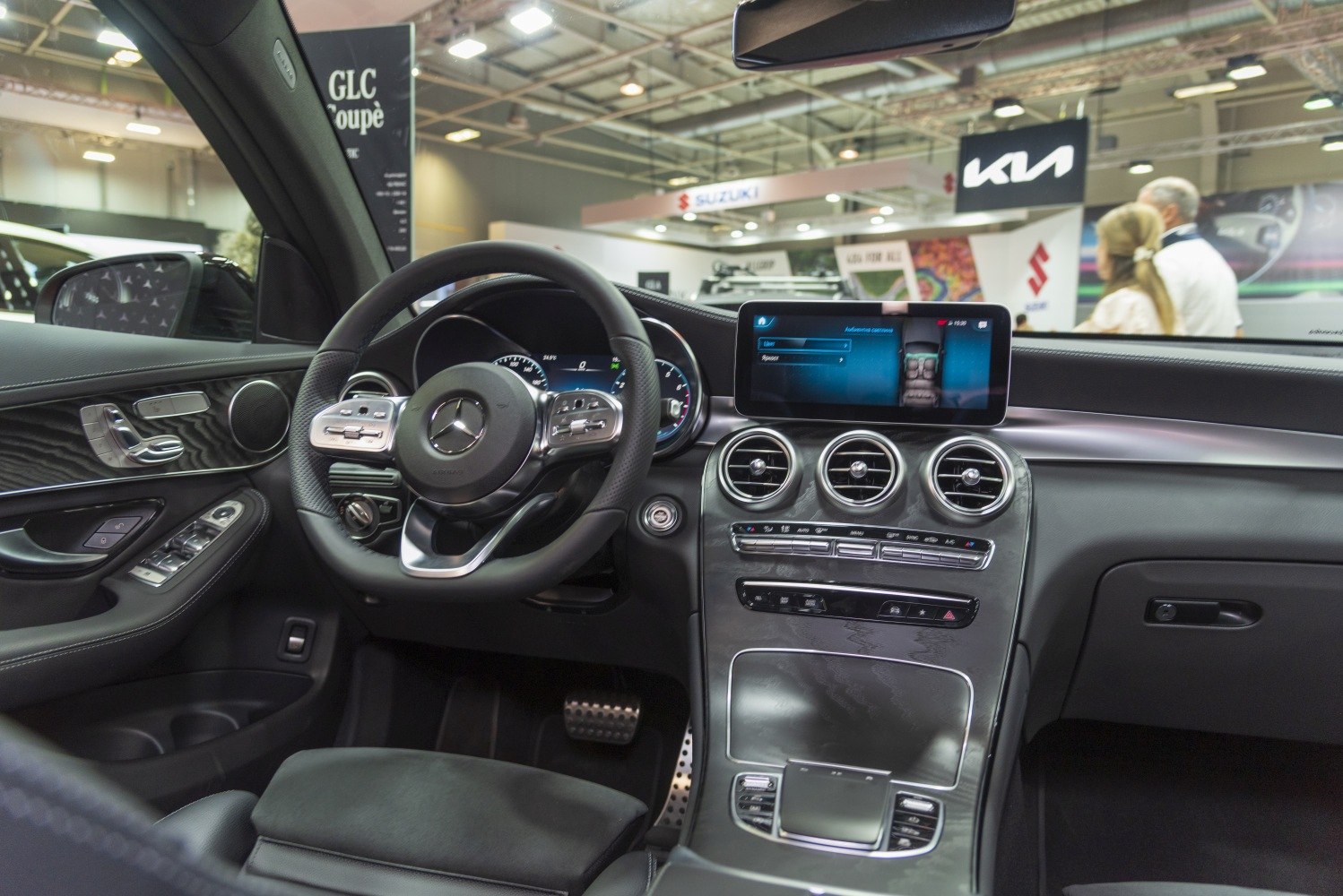 Modern luxury dashboard and digital infotainment display with multifunction steering wheel