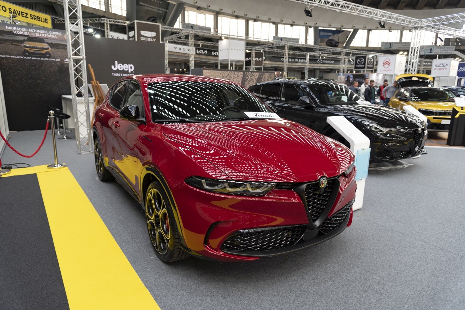 Front view focusing on distinctive grille and stylish wheels.