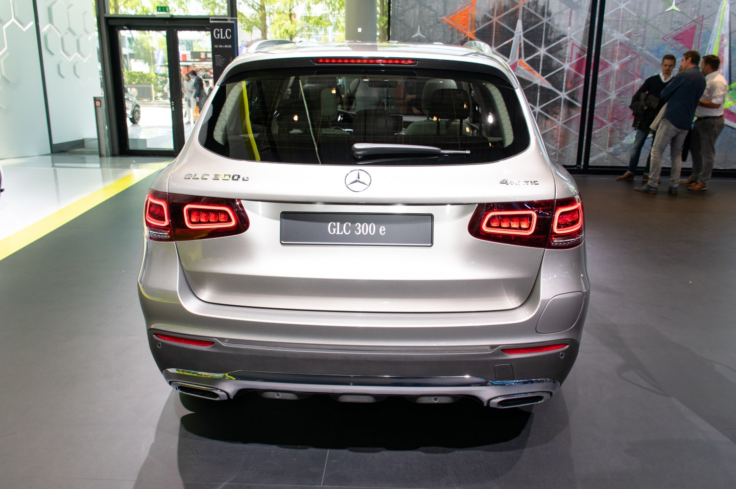 Rear view with illuminated taillights and 4MATIC badge