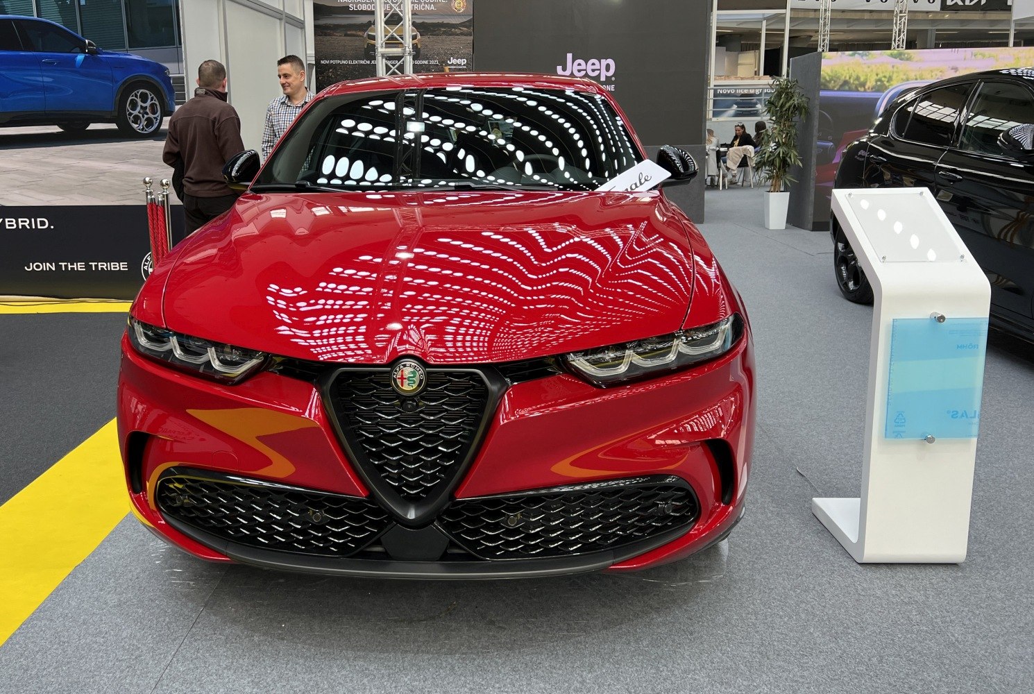 Front view with grille and LED headlights