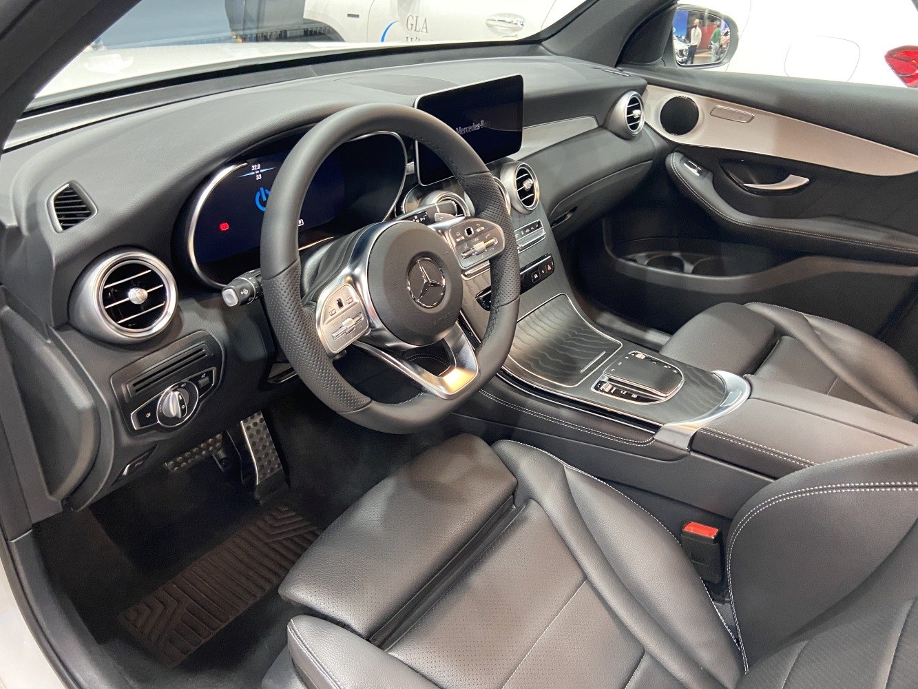 Luxury SUV interior with digital dashboard and modern center console