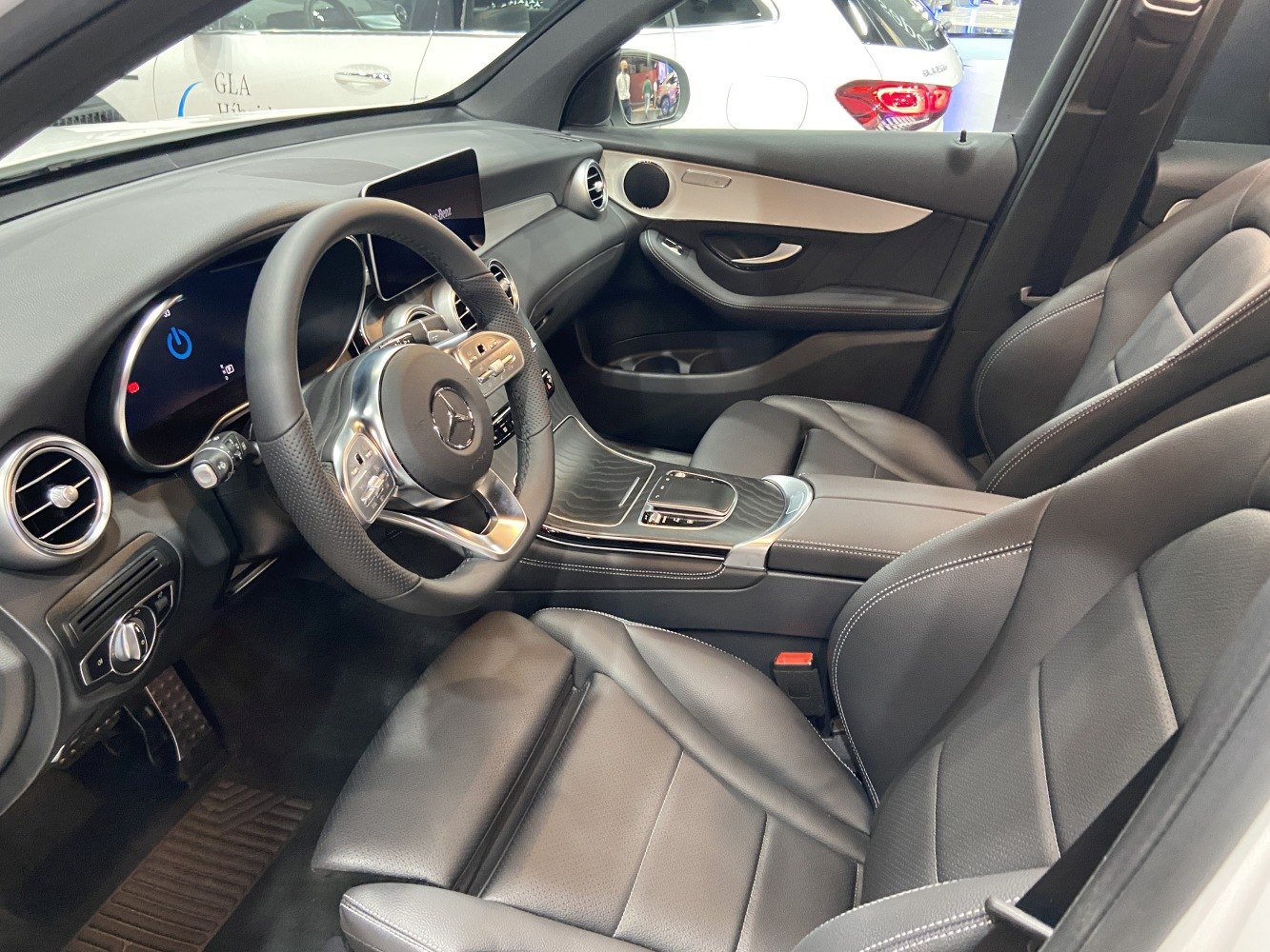 Modern luxury SUV interior with leather seats and digital dashboard