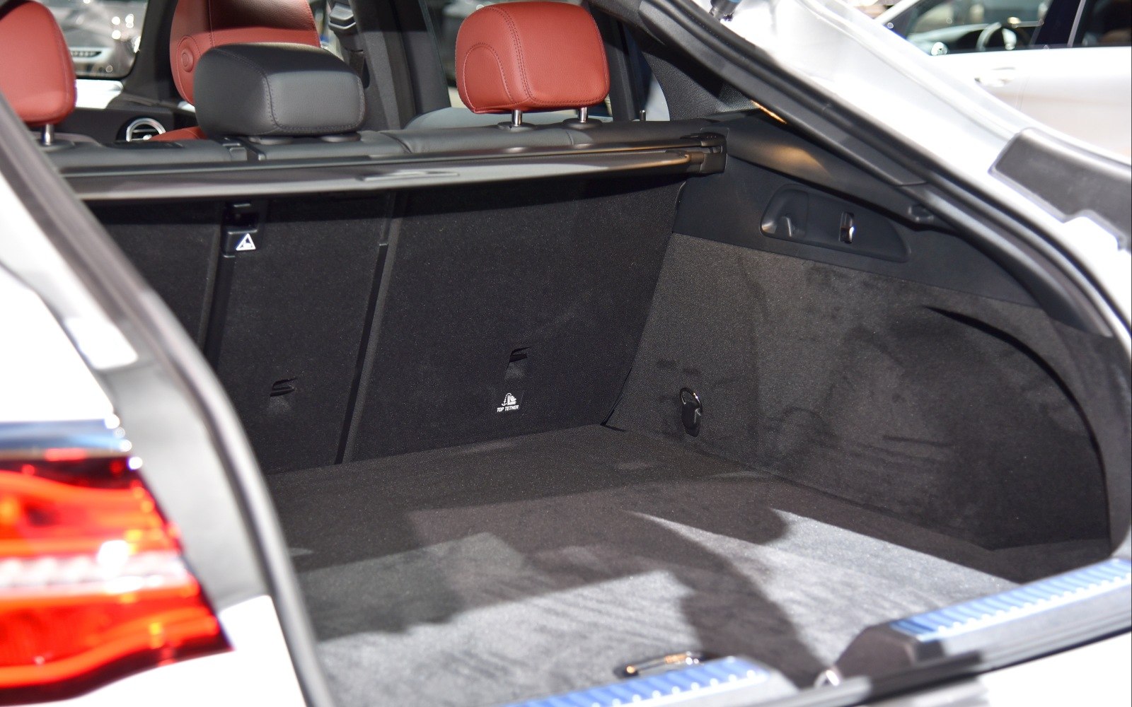 Spacious carpeted trunk with privacy cover and rear seatbacks