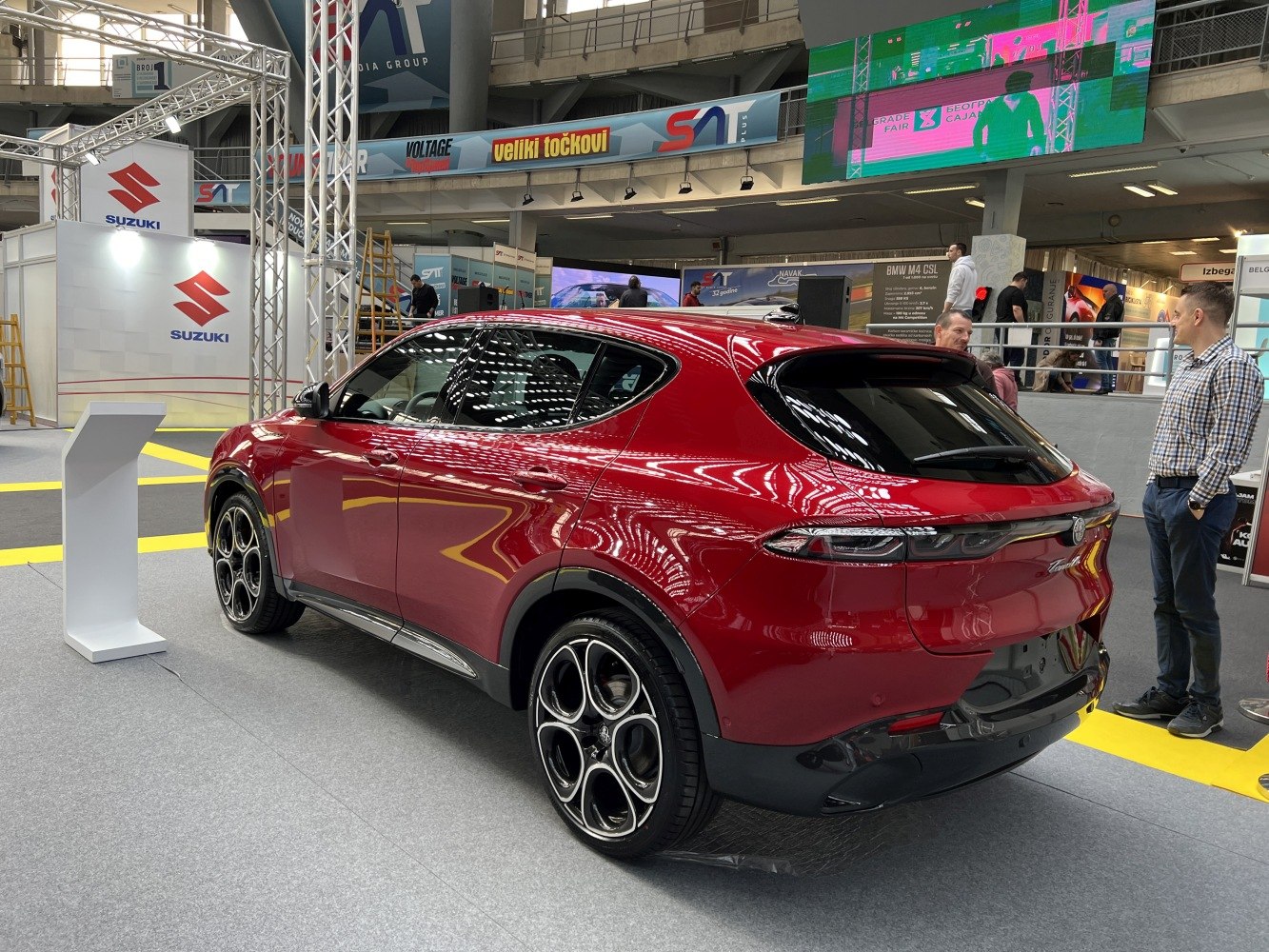 Rear three-quarter view of a compact SUV with sporty five-hole alloy wheels.