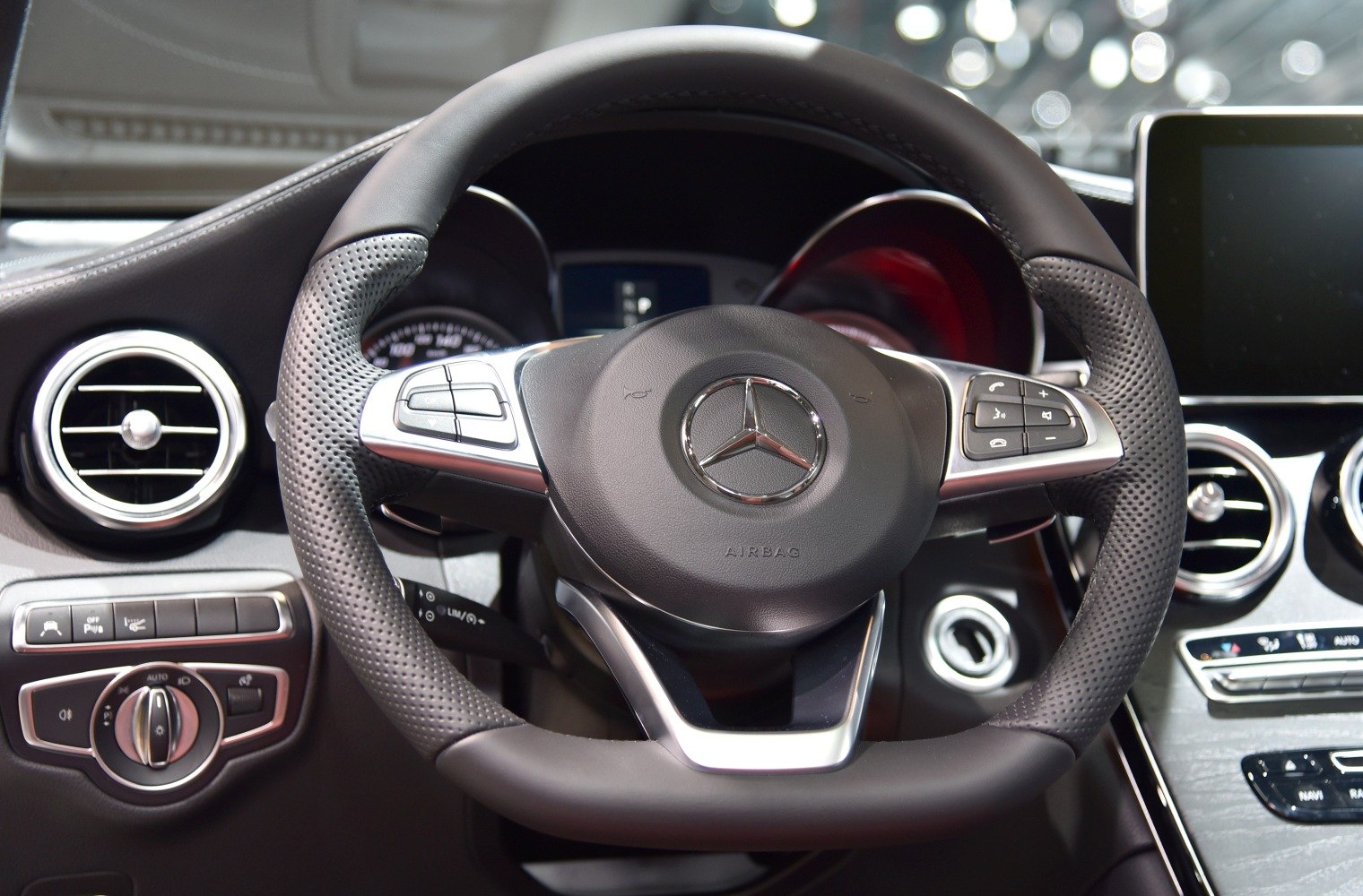 Mercedes-Benz steering wheel with dashboard and air vents