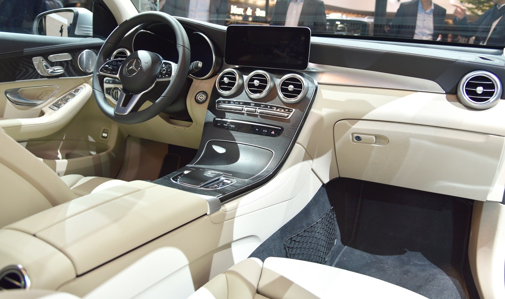 Beige leather interior with modern dashboard and steering wheel