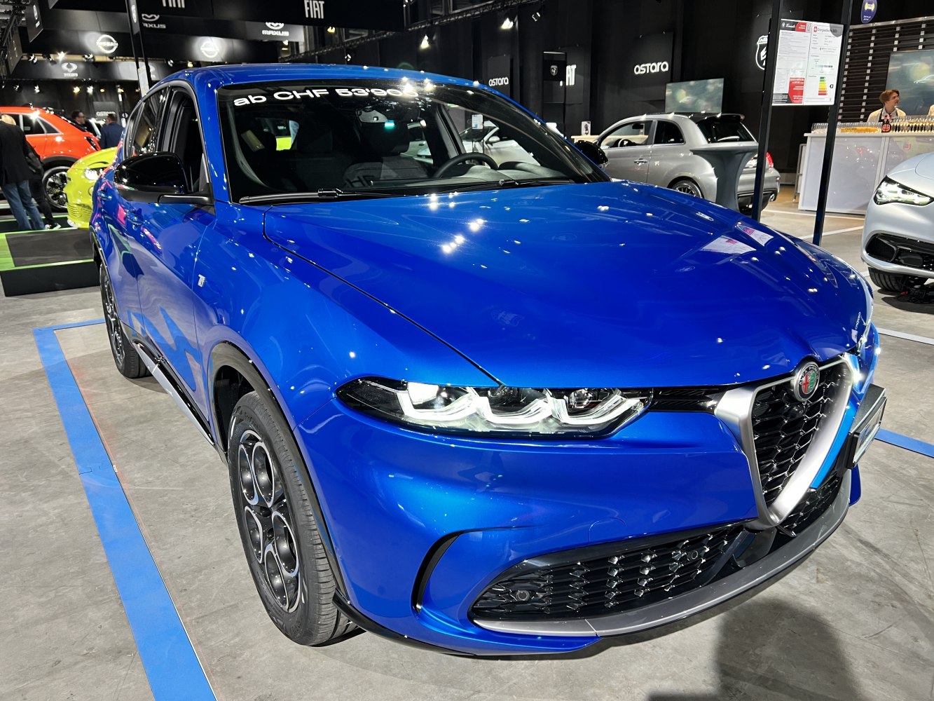 Close-up of premium SUV front with LED headlights and signature grille
