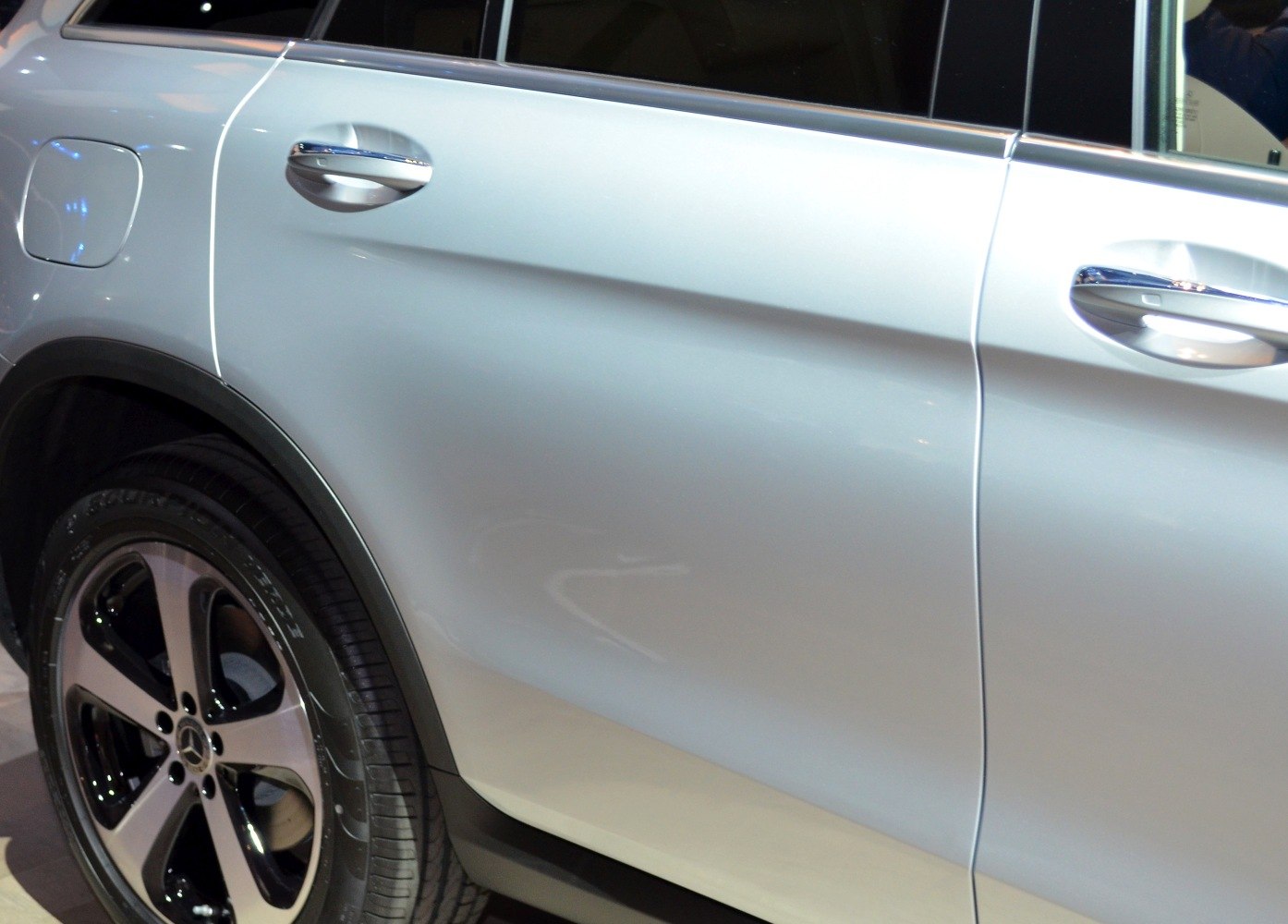 Side door with fuel cap and alloy wheel close-up