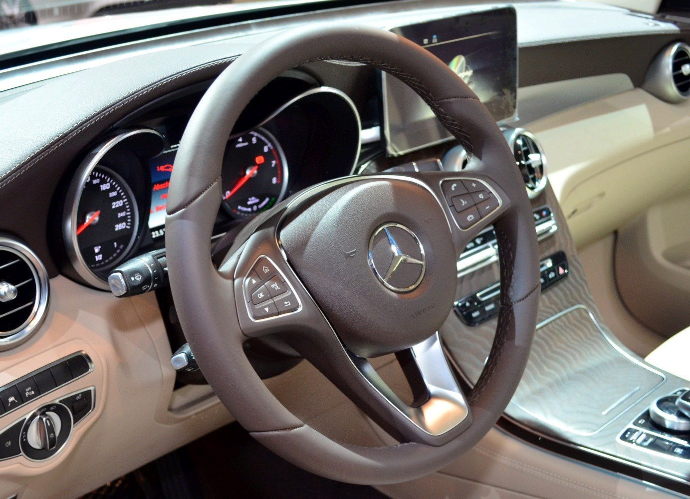 Luxury leather steering wheel and digital dashboard cluster