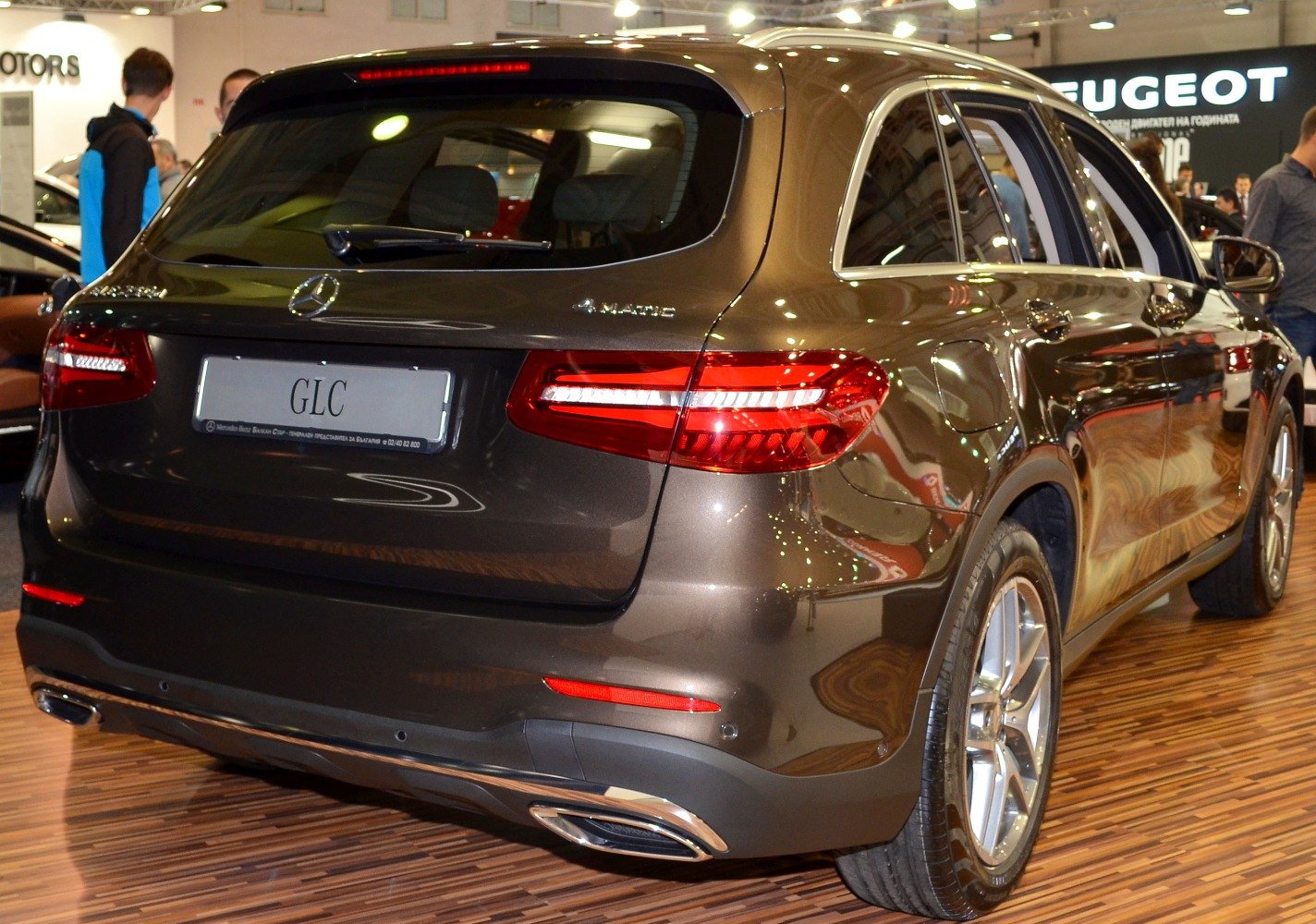 Rear view of luxury SUV with LED taillights and dual exhaust