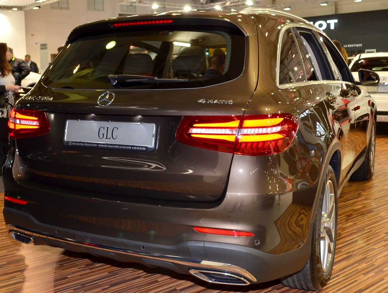 LED tail lights and dual exhaust on rear SUV