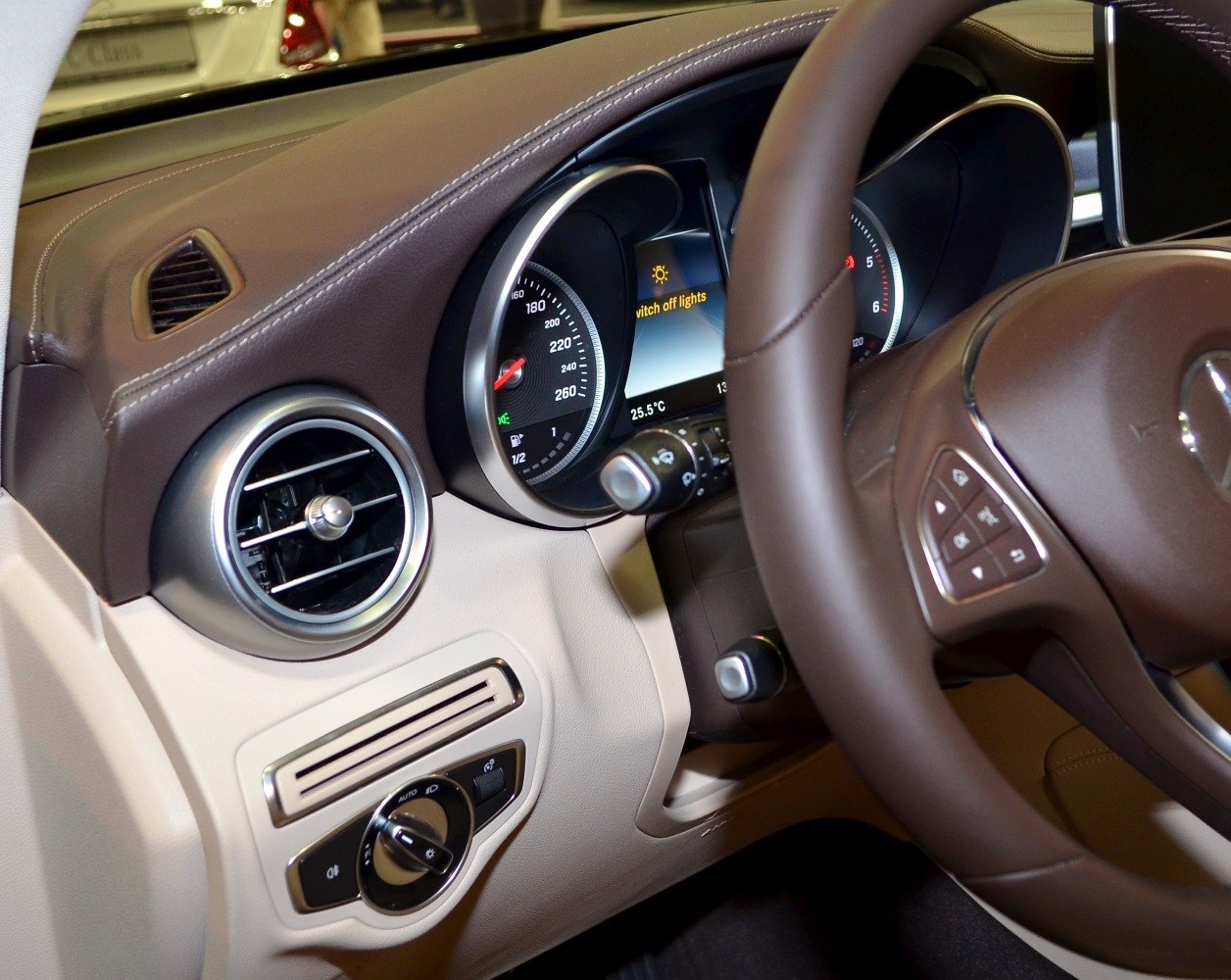 Dashboard speedometer, air vent, steering wheel controls