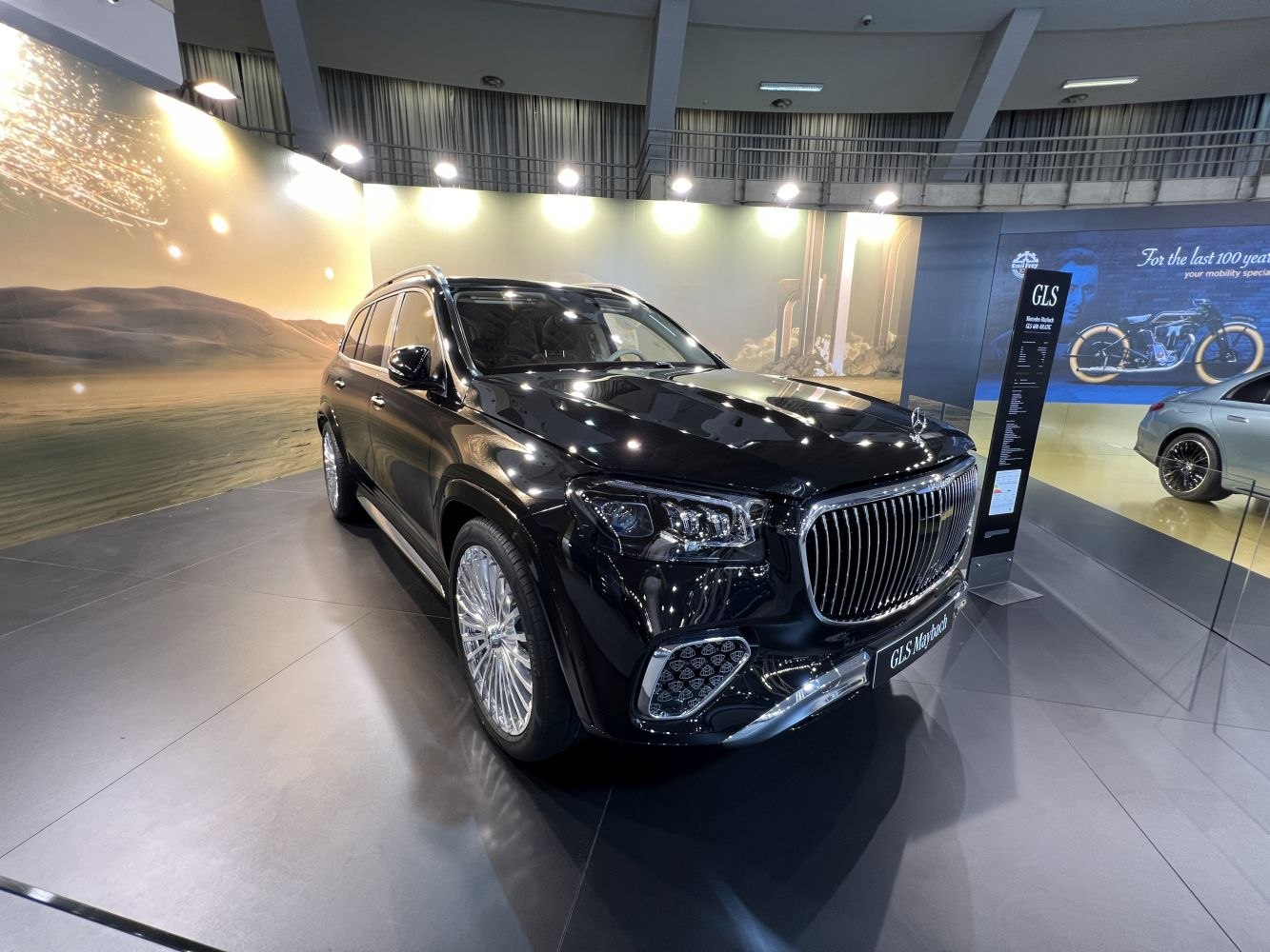 Vertical grille and LED headlights on luxury SUV front in black