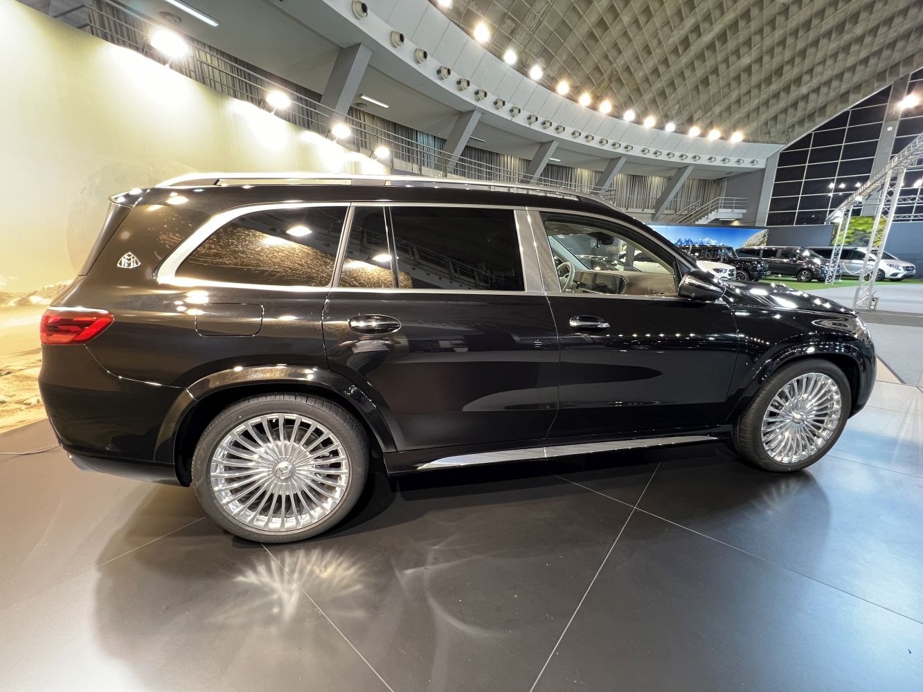 Luxury SUV with multi-spoke alloy wheels and chrome trim