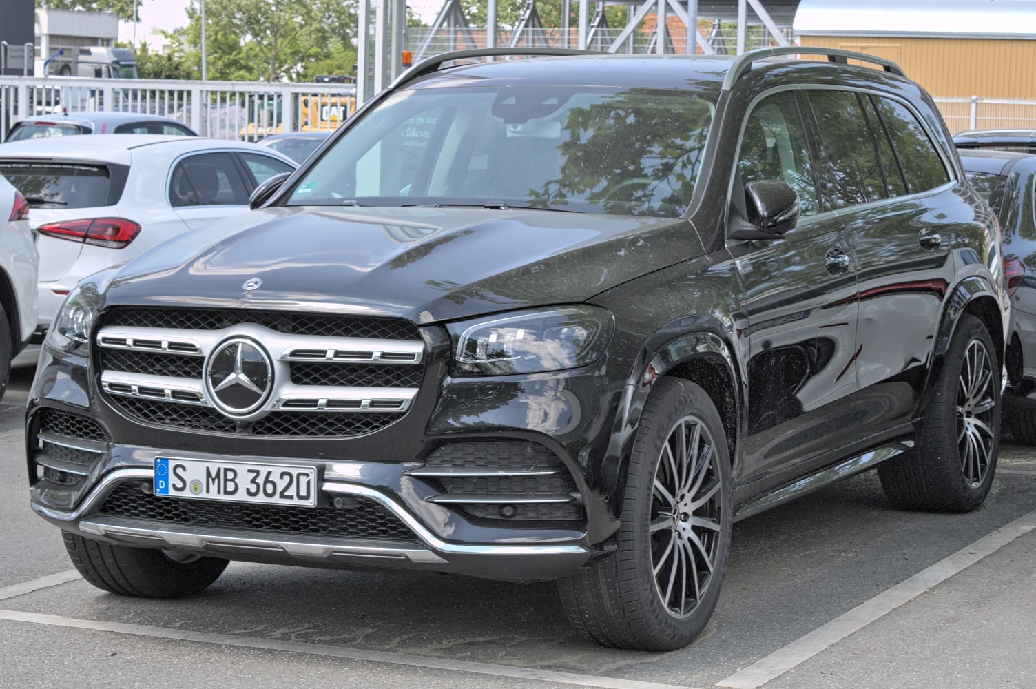 Black luxury SUV front with distinctive grille and modern headlights
