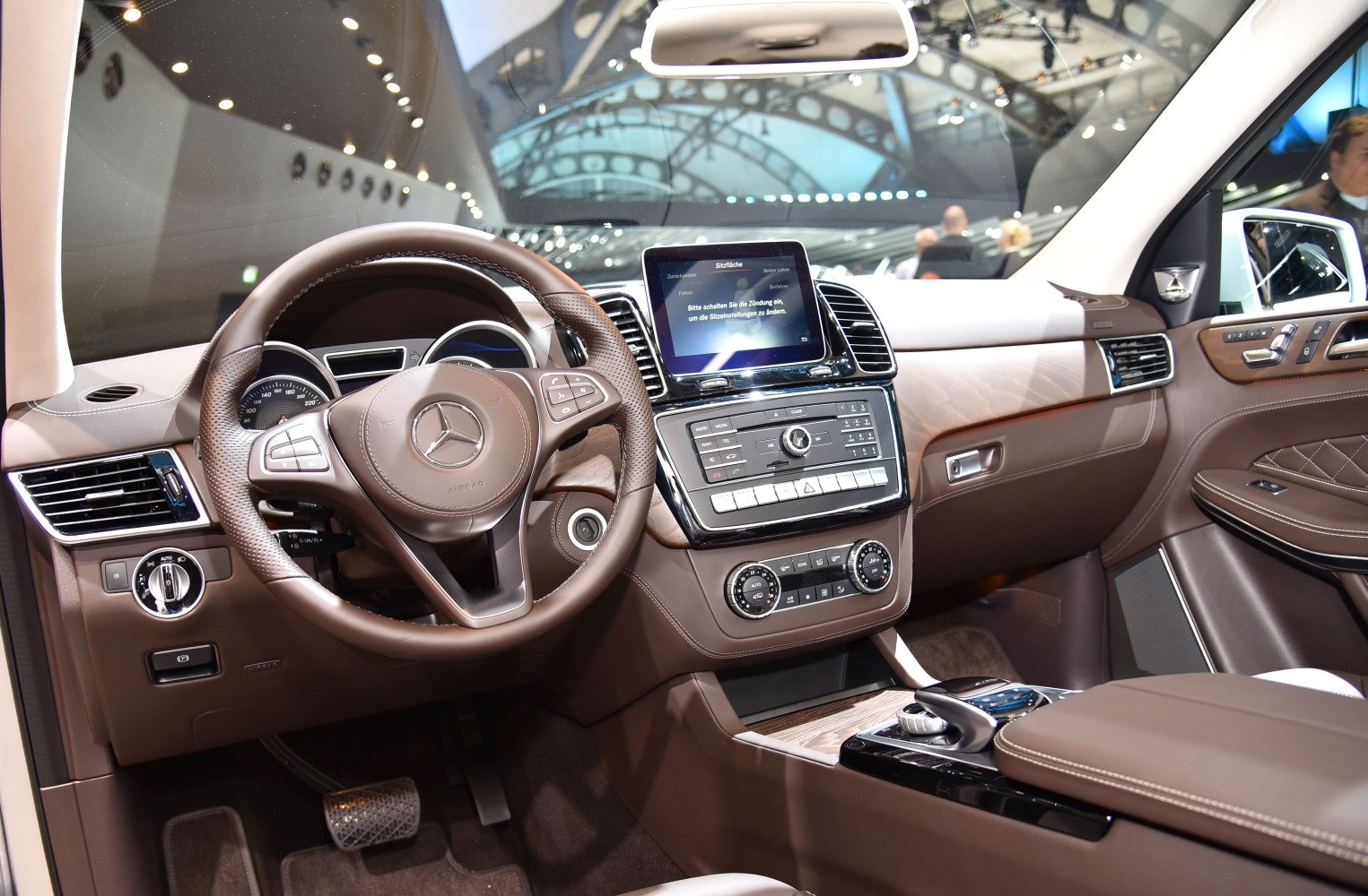 Luxury SUV interior with advanced dashboard and multifunction steering wheel
