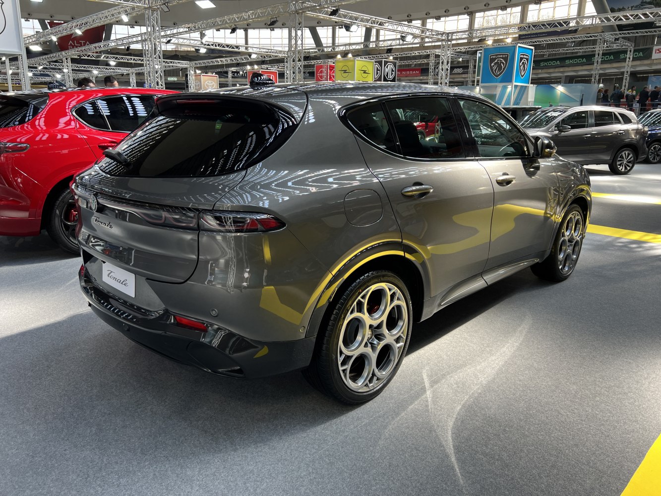 Rear styling with distinctive multi-spoke alloy wheels on a sleek crossover SUV