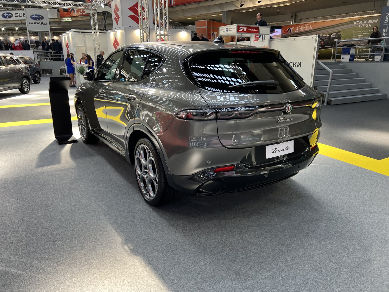 Rear view of hatchback with LED tail lights and distinctive wheel design