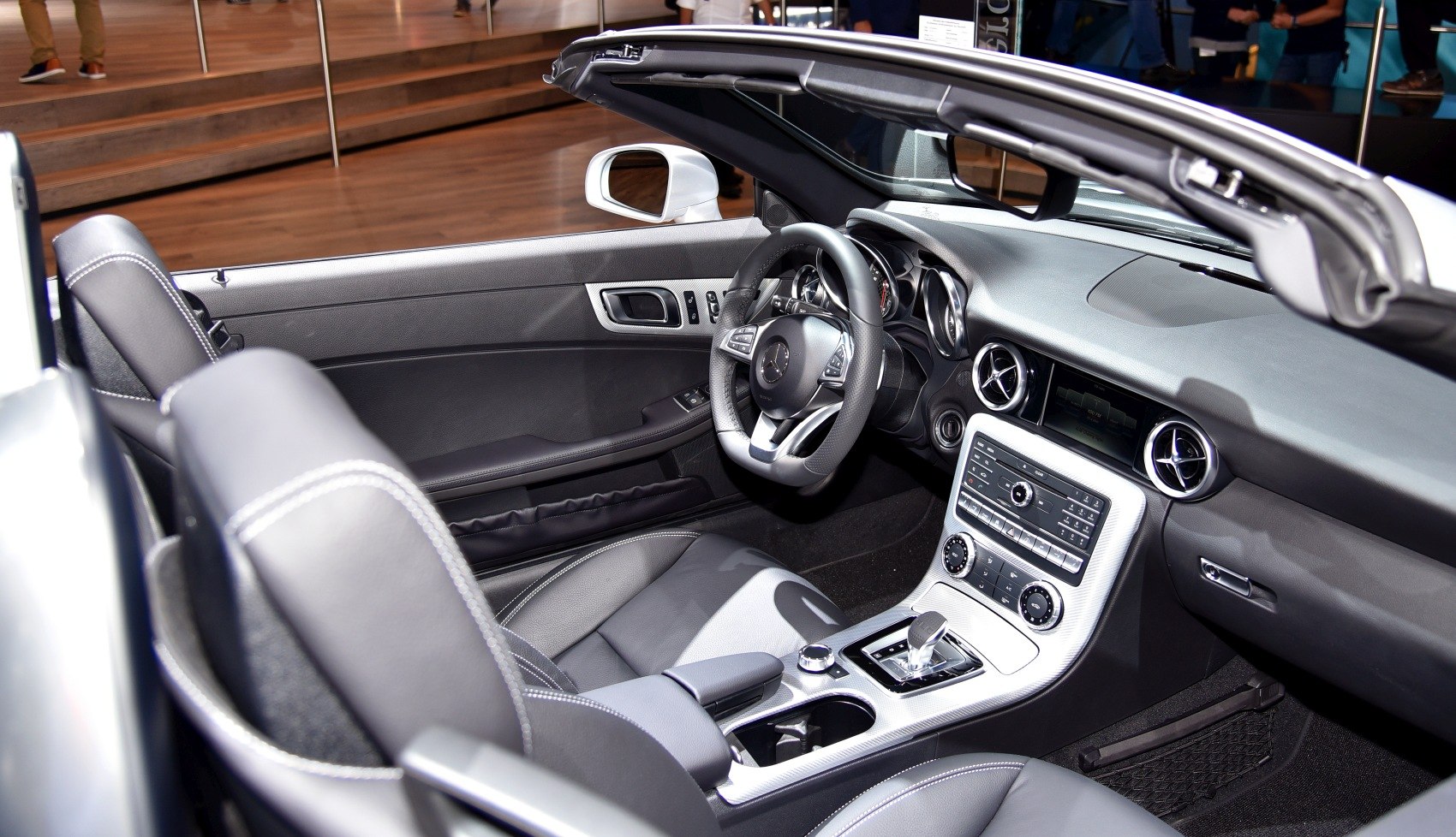 Convertible luxury interior with sport seats and advanced control console