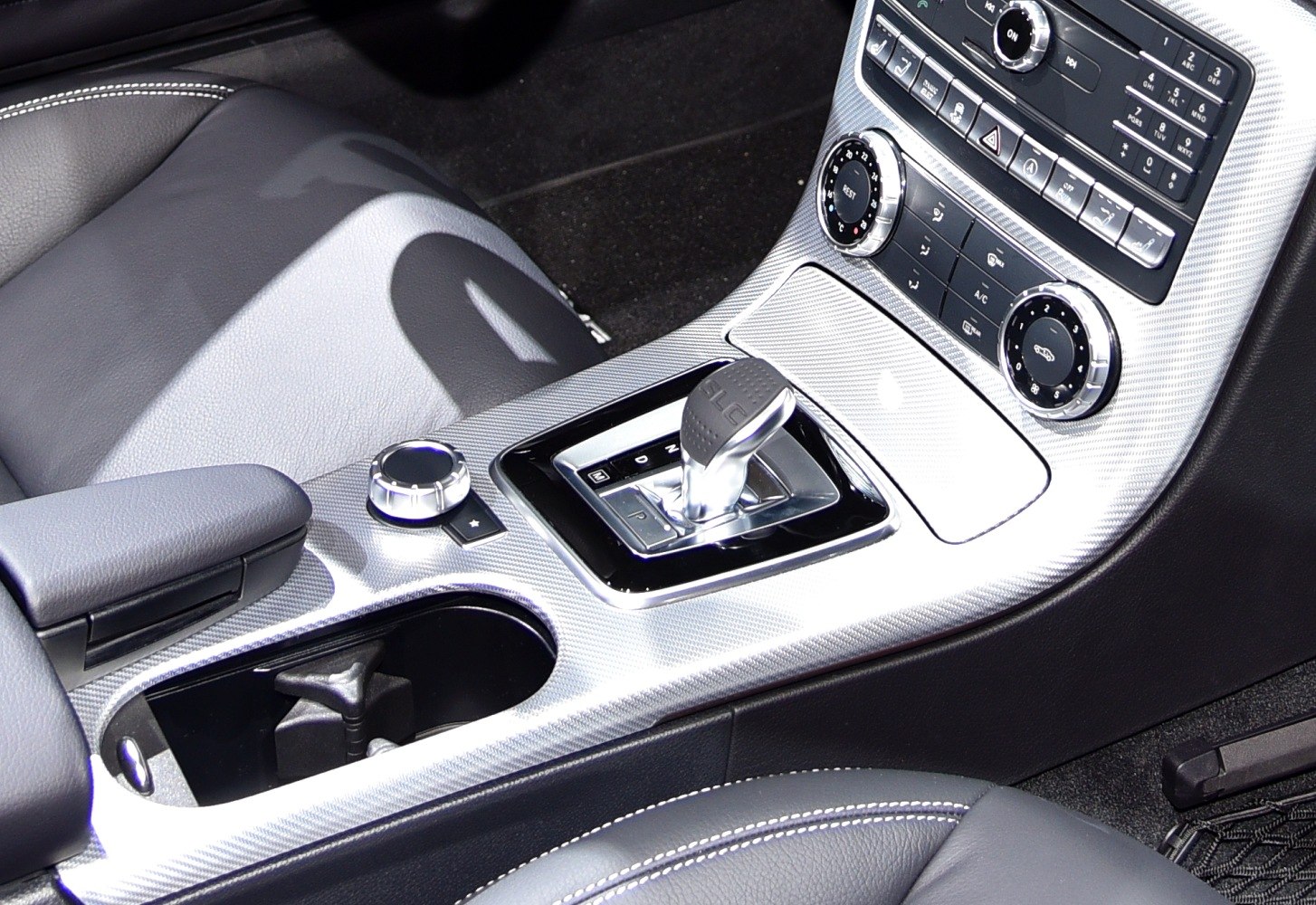 Gear shifter and climate control panel in car center console