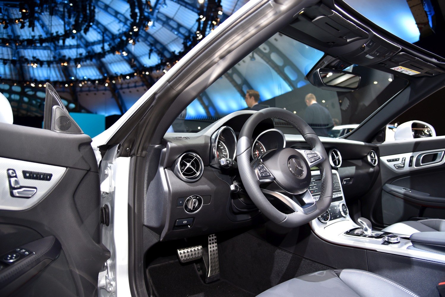 Sporty steering wheel and modern dashboard of a luxury convertible