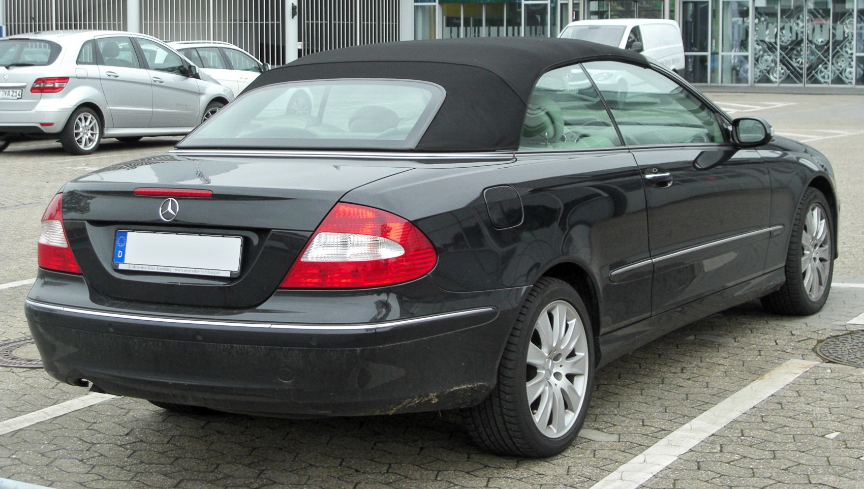 Convertible rear view with soft top and distinctive taillights