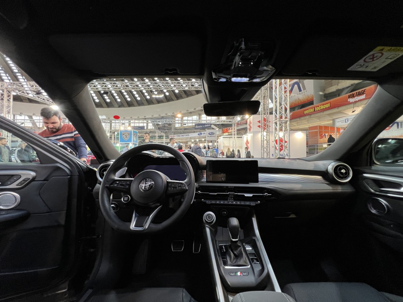 Steering wheel with logo and digital dashboard interior