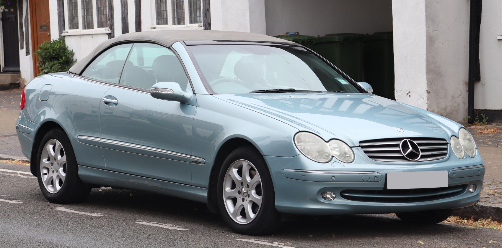 Convertible with soft fabric roof and sleek two-door design