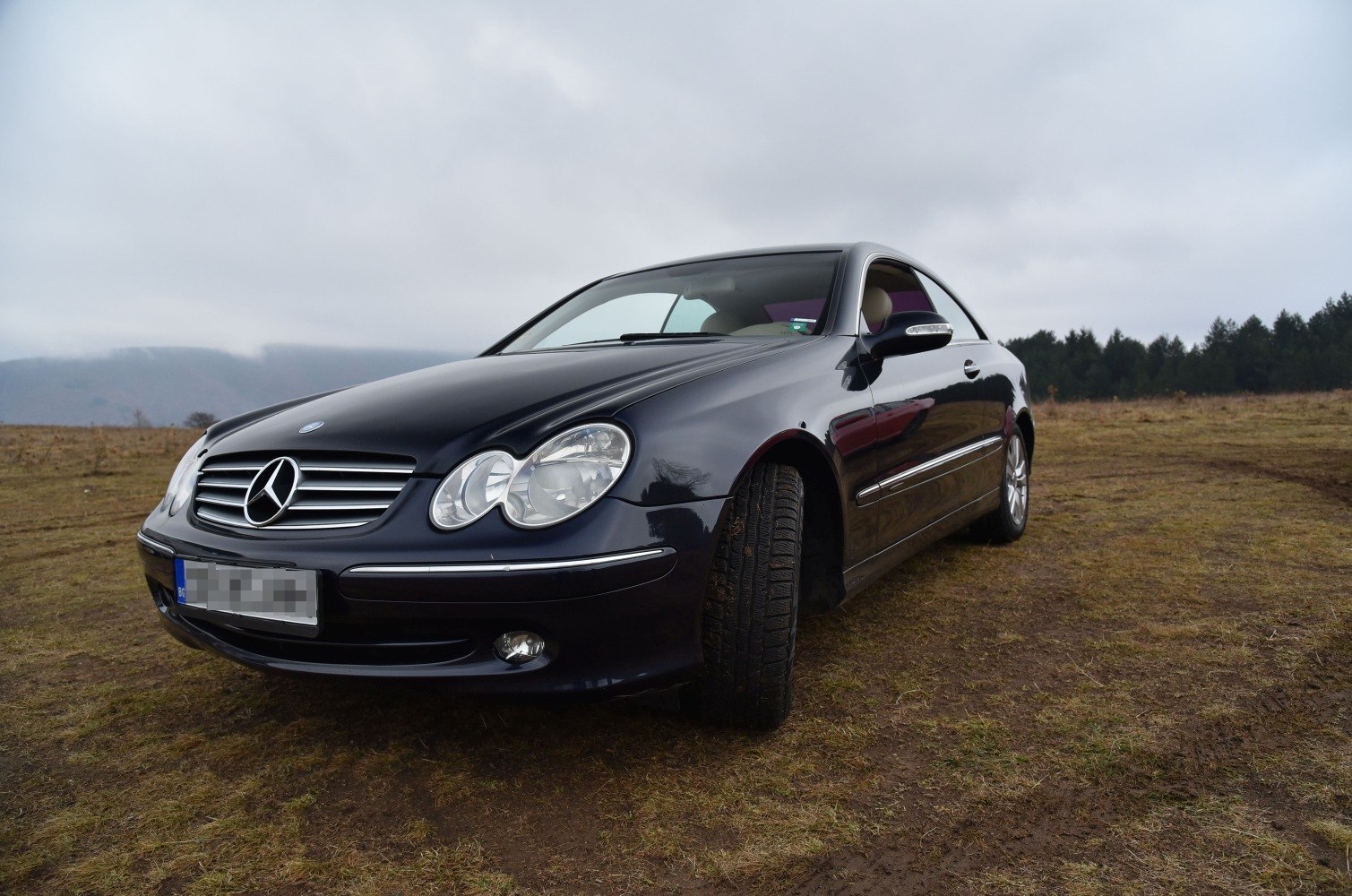 Front angle view with distinct headlights and grille.